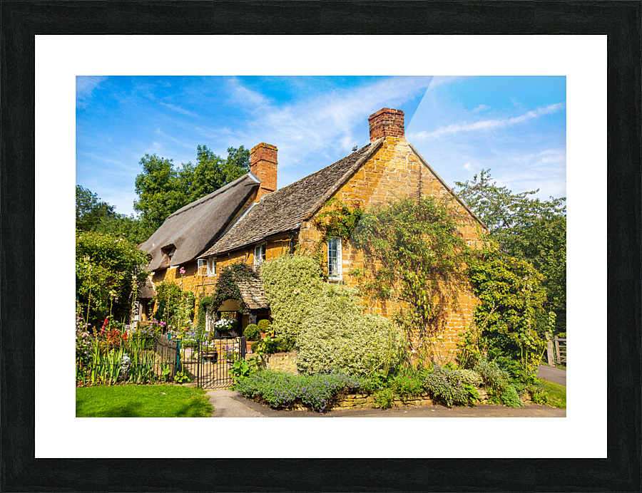 Old cotswold stone house in Ilmington Picture Frame print