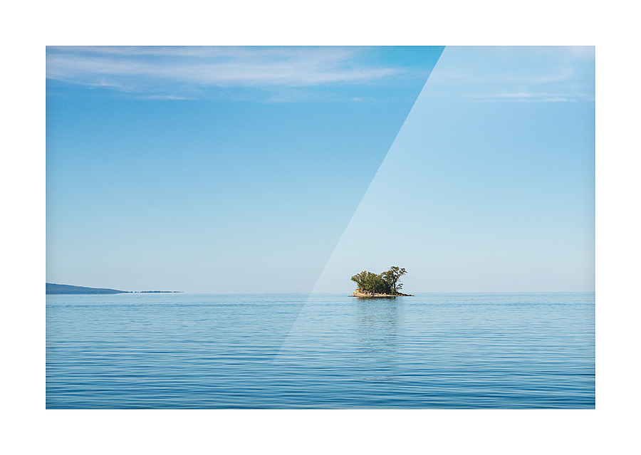Small rocky island in Lake Champlain Picture Frame print