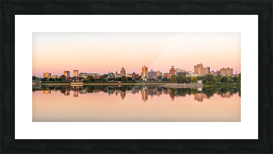 Sunset illuminates the city skyline of Harrisburg in Pennsylvani Picture Frame print