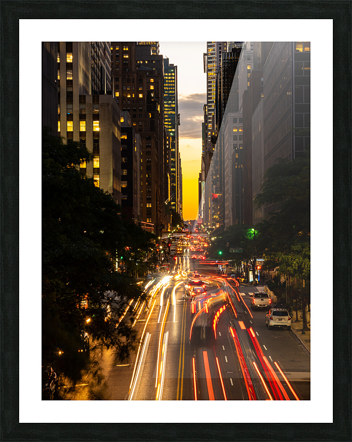 Traffic streams on 42nd street in NY after sunset Picture Frame print