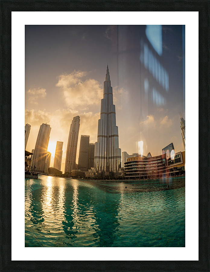 Sunset over the Dubai downtown business district Picture Frame print