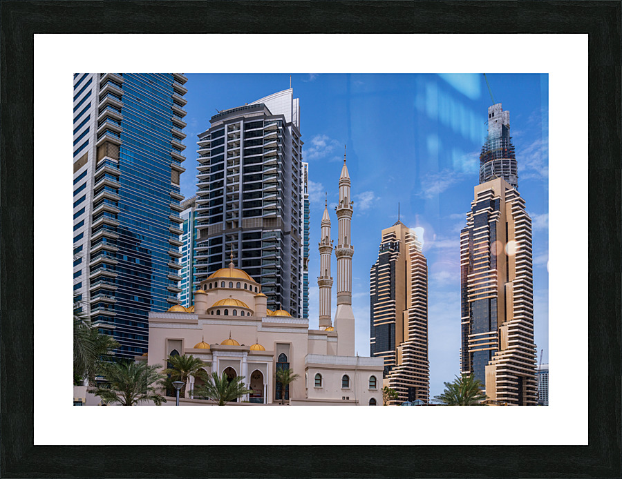 Mosque among towers on the waterfront at Dubai Marina UAE Picture Frame print