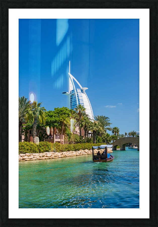 Modern buildings waterways by Souk Madinat Jumeirah in Dubai Picture Frame print