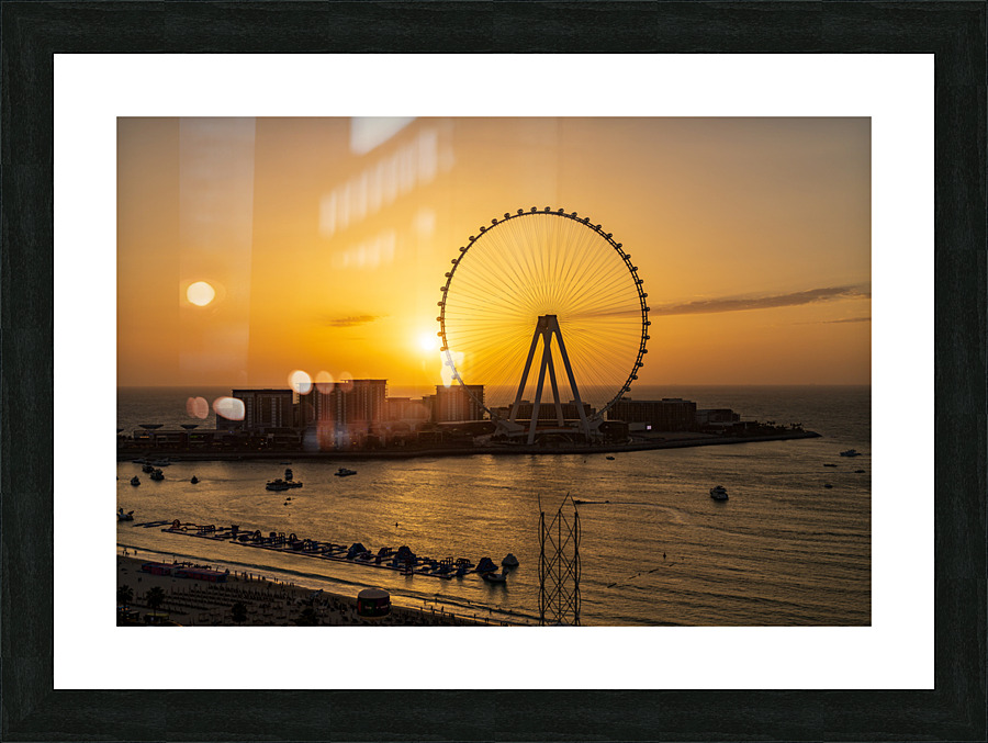 Sunset behind Ain Dubai observation wheel on Bluewaters Island Picture Frame print