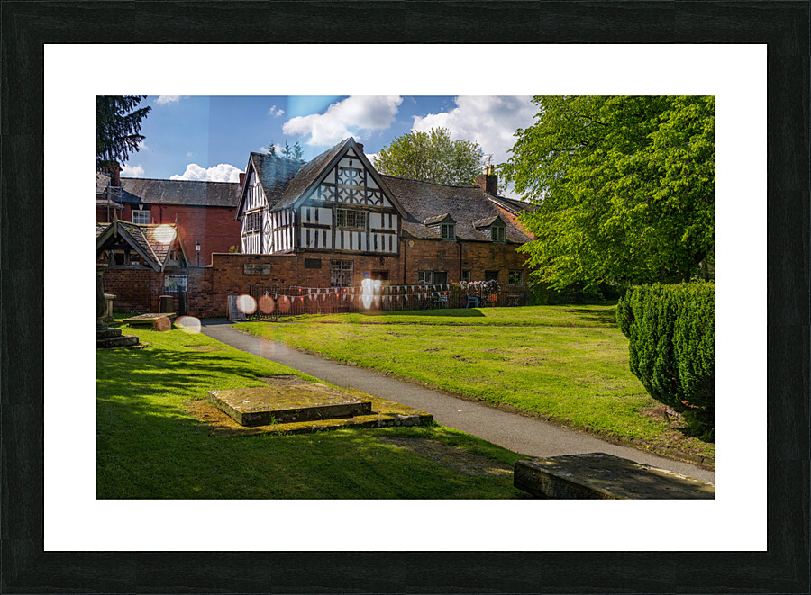 Old School House building in graveyard in Oswestry Picture Frame print