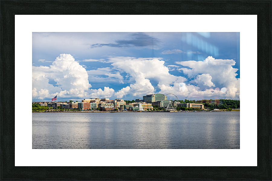 Dramatic clouds above National Harbor in Maryland near Washingto Picture Frame print