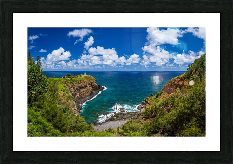 Kilauea lighthouse on headland against blue sky on Kauai Picture Frame print