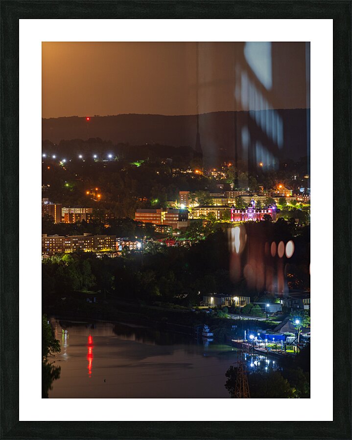 Supermoon rises in the sky above Morgantown in West Virginia Picture Frame print