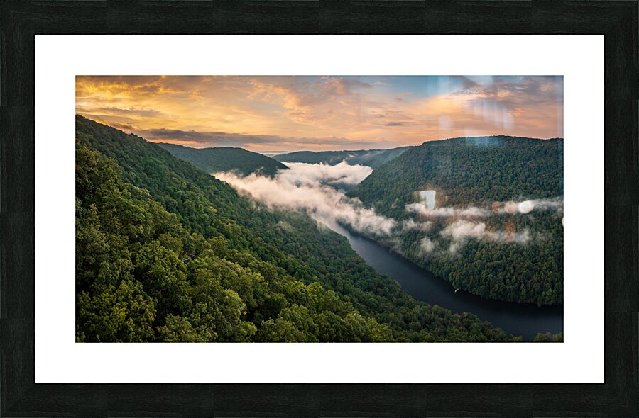 Mist swirling over Cheat River gorge at sunrise near Morgantown  Picture Frame print