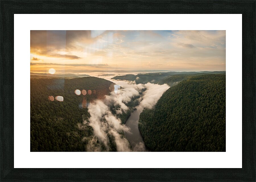 Mist swirling over Cheat River gorge at sunrise near Morgantown  Picture Frame print