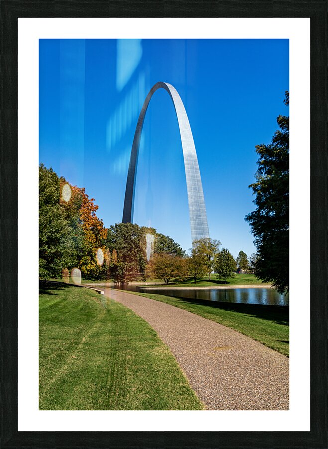 Gateway Arch of St Louis Missouri from the park and lake Picture Frame print