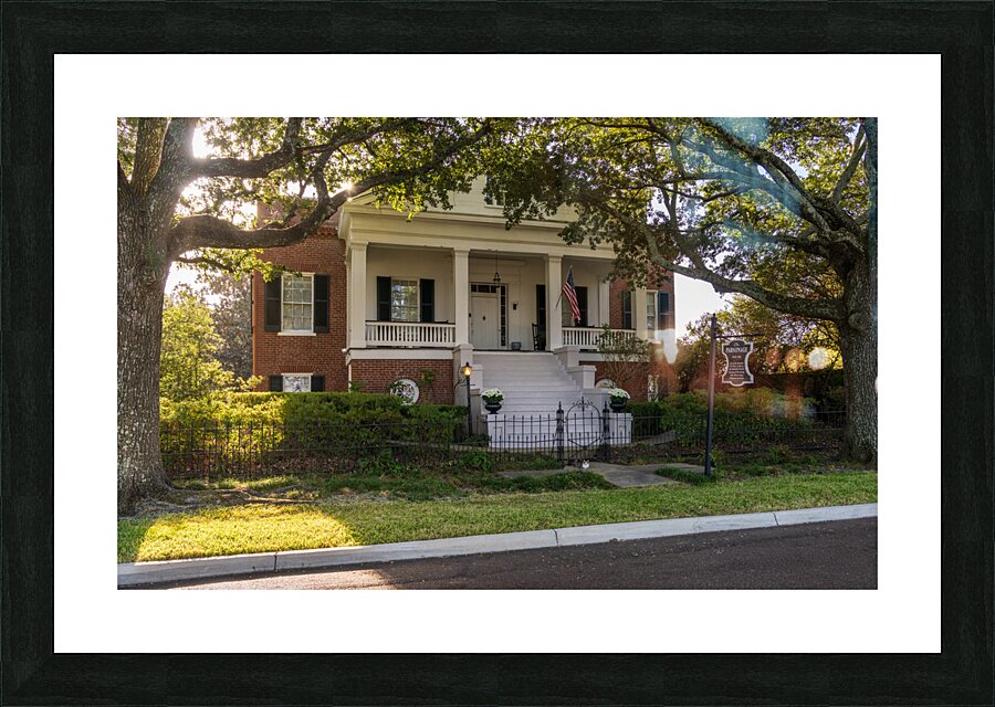 Facade of antebellum home in Natchez in Mississippi Picture Frame print