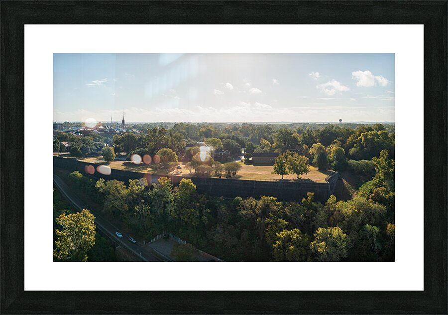 Townscape of Natchez in Mississippi with old mansion grounds Picture Frame print