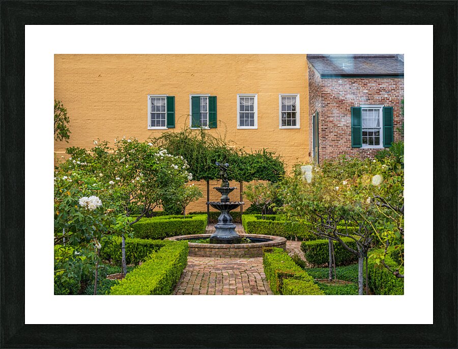 Small tree filled garden in French Quarter of New Orleans Picture Frame print