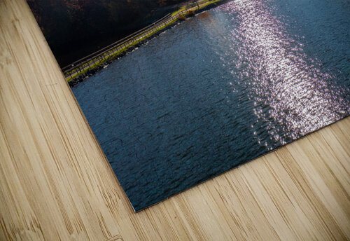 Sunburst above fall trees around the water at Cheat Lake Park Steve Heap puzzle