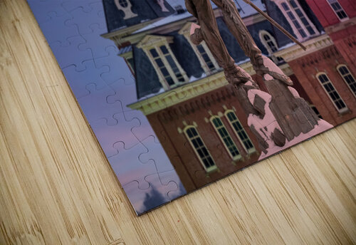 Mountaineer statue against Woodburn Hall tower Steve Heap puzzle