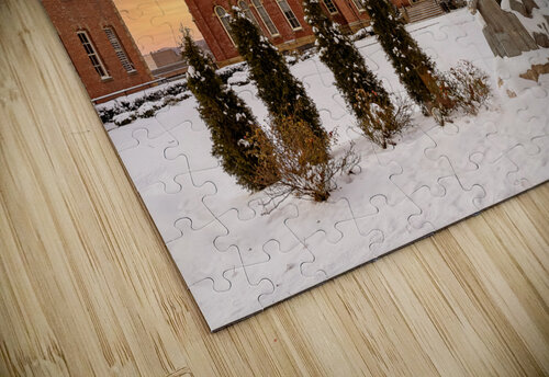 Mountaineer statue against Woodburn Hall Steve Heap puzzle