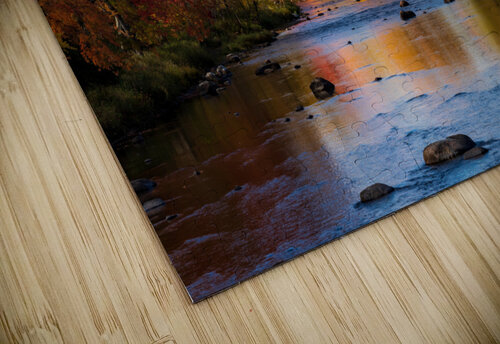 Saranac river flows through multi-colored fall landscape in Adir Steve Heap puzzle
