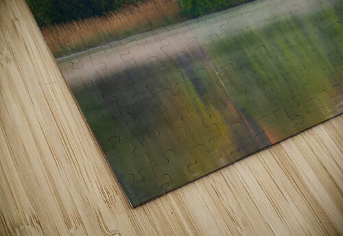 Sunset view across Ellesmere Mere in Shropshire to church Steve Heap puzzle