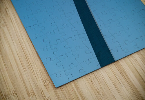 Unusual view of Gateway Arch at sunrise against blue sky Steve Heap puzzle