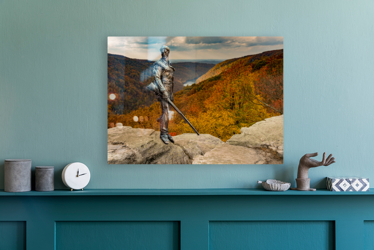 Mountaineer statue from WVU with fall leaves in West Virginia Reproduction