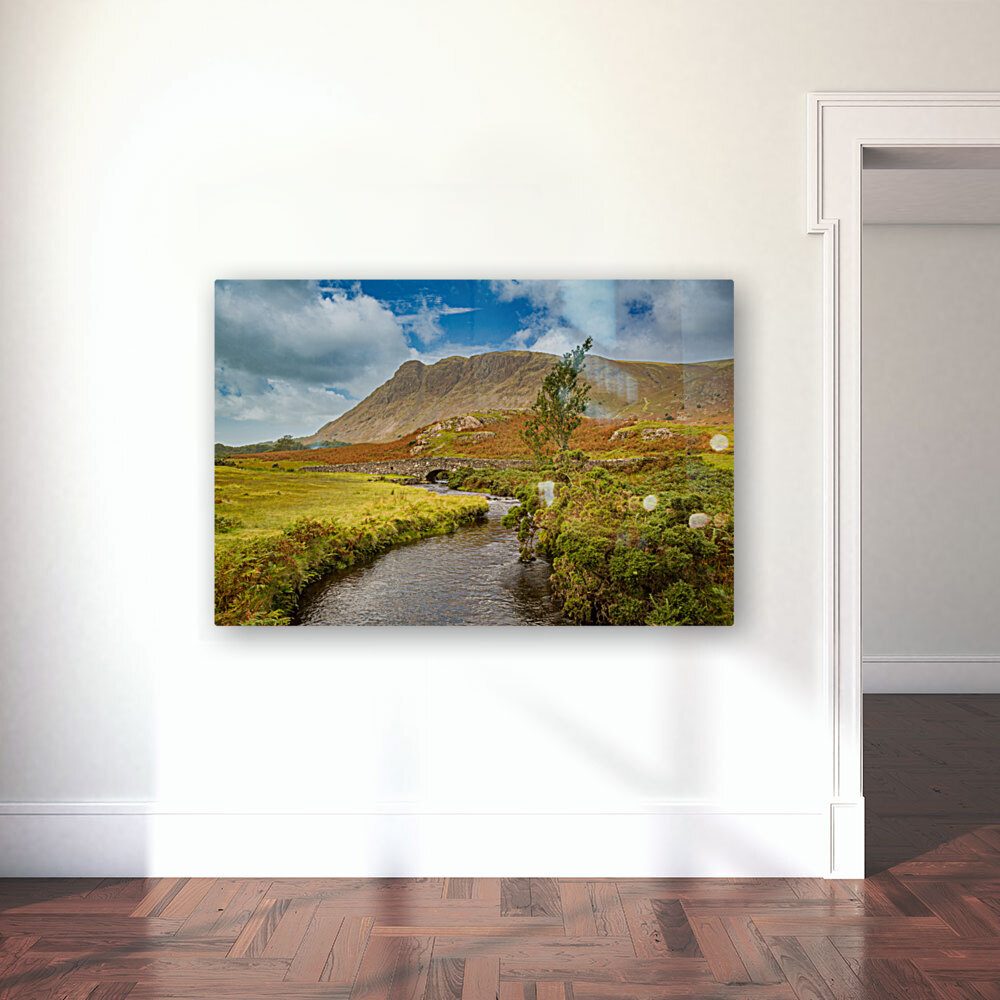 Stone bridge over river by Wastwater Reproduction