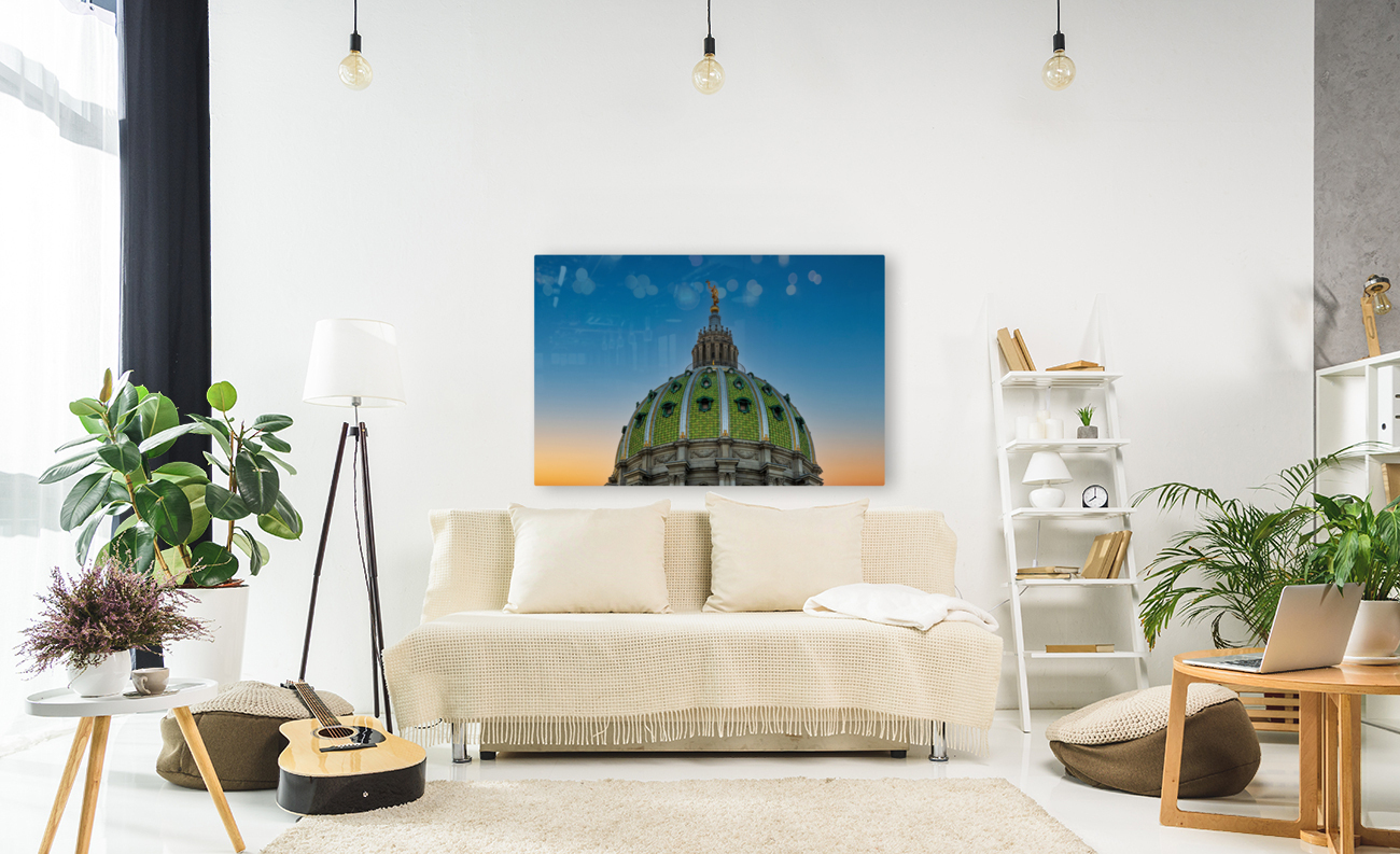 Sun sets behind the ornate dome of Pennyslvania State Capitol Reproduction