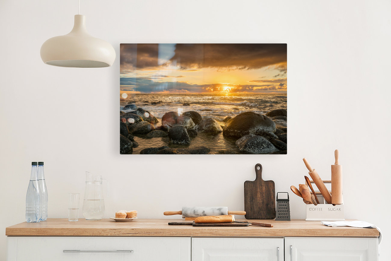 Sunset over rocks from Kee Beach Reproduction