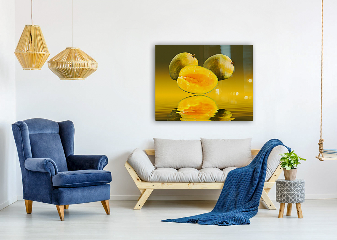 Two mangoes and one cut mango reflecting Reproduction