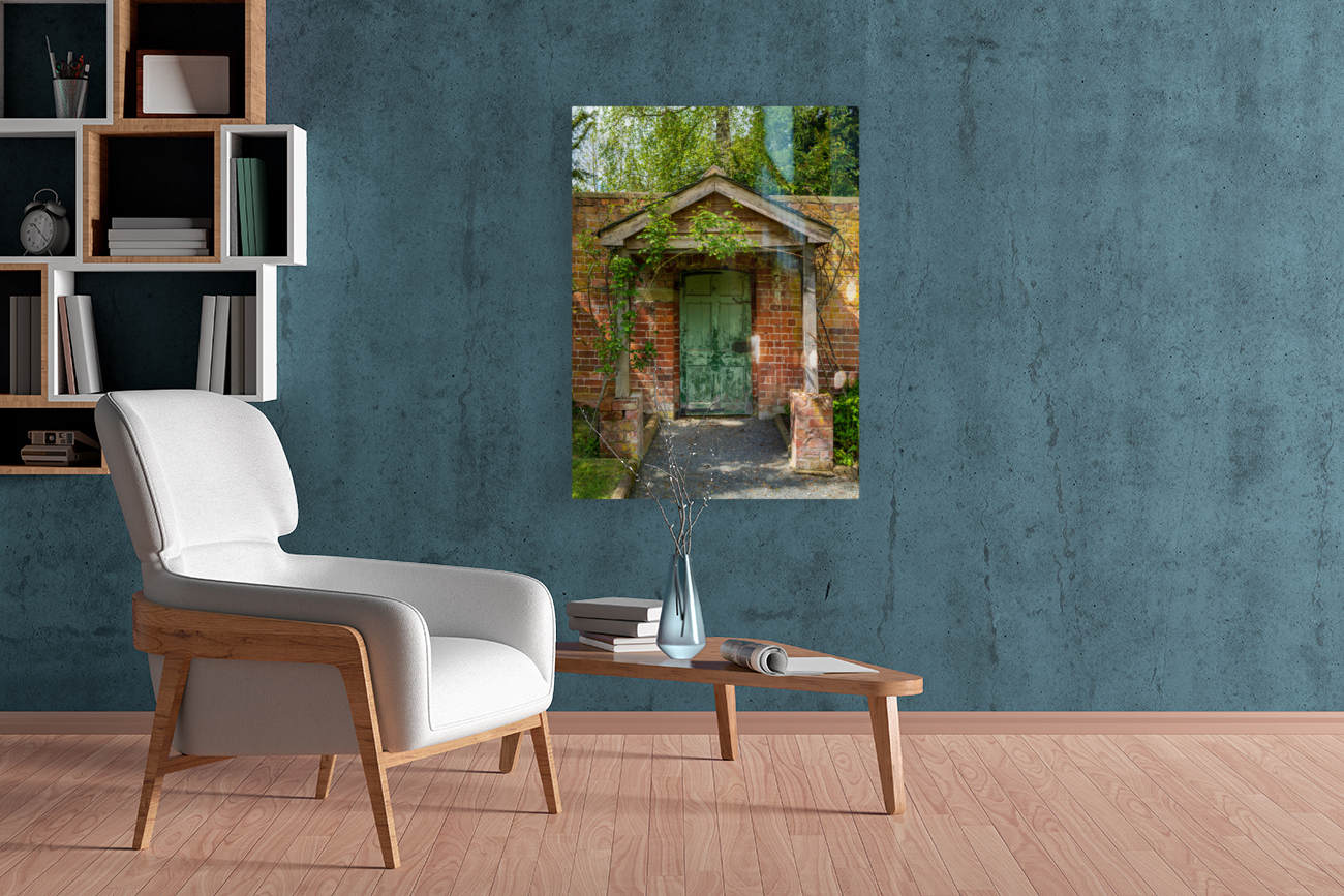 Painted green door and porch in walled garden wall Reproduction