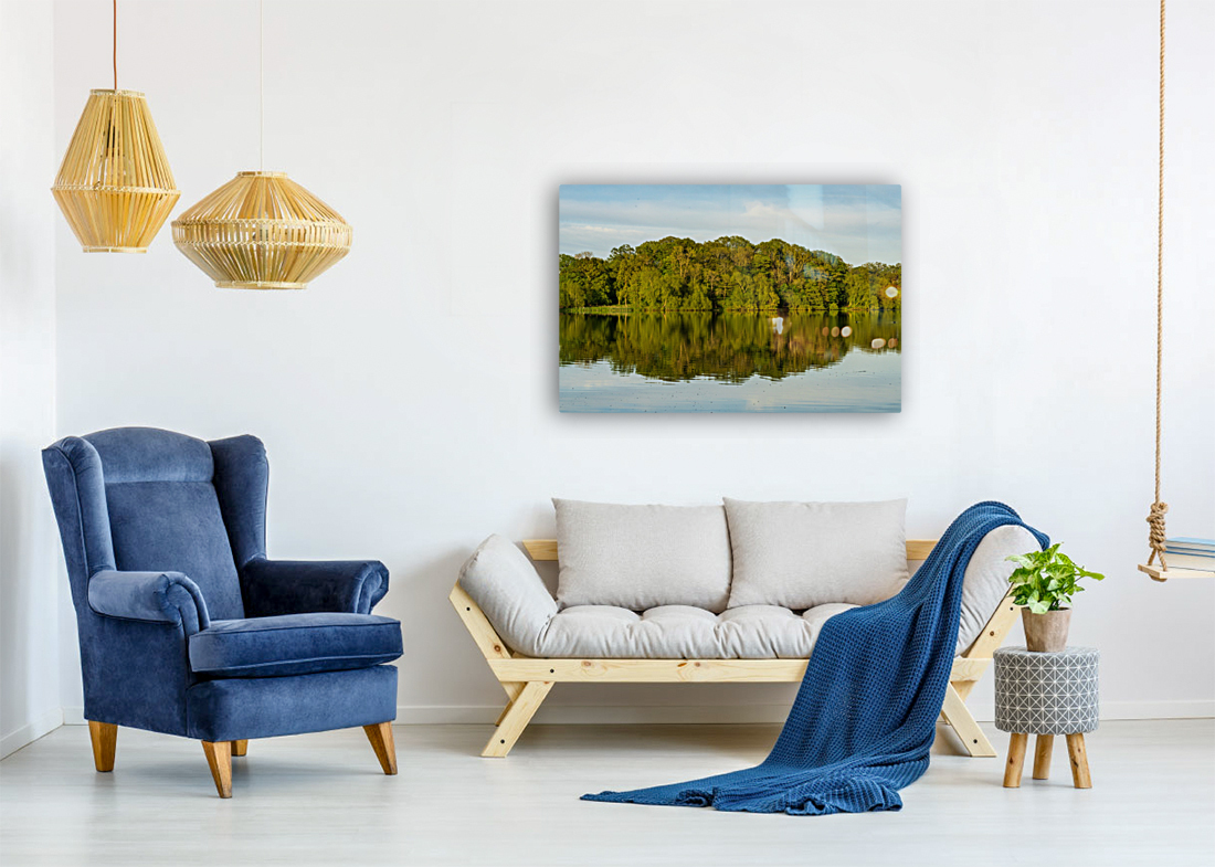 View across the Mere to a reflection of distant trees in Ellesme Reproduction