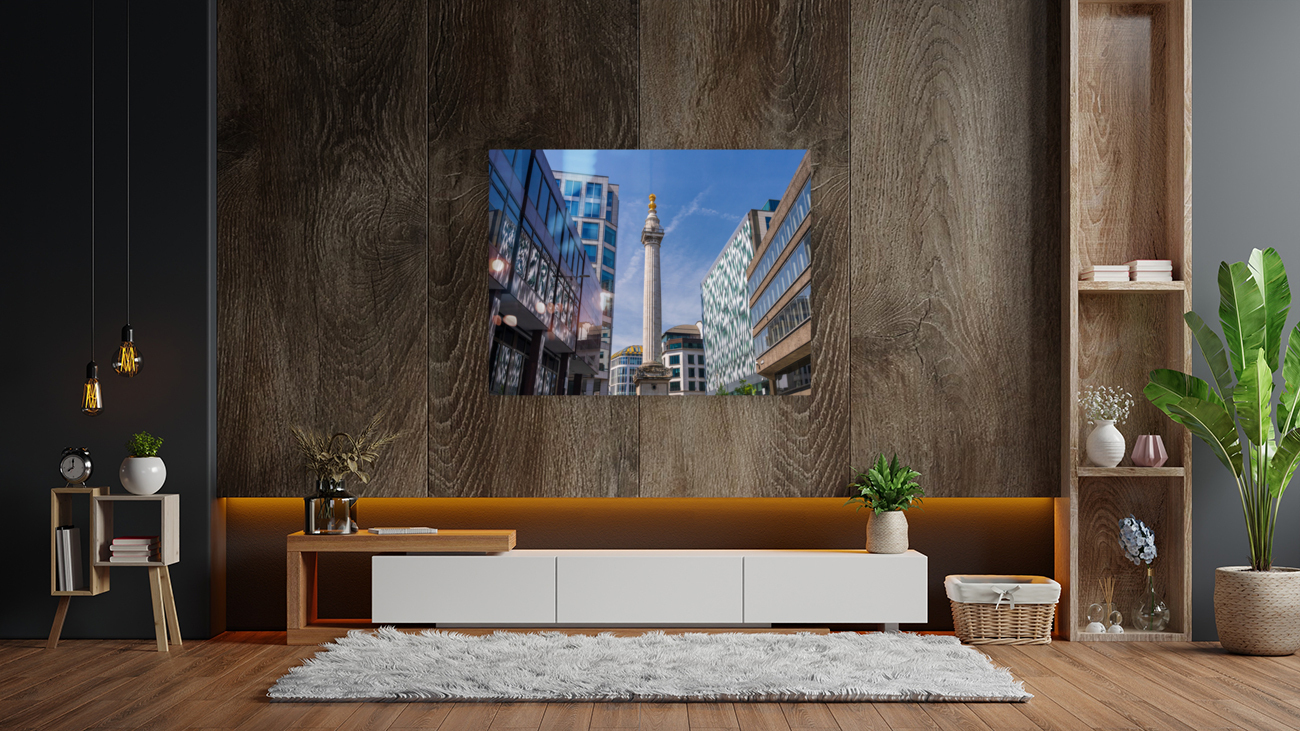 Modern office buildings surround the Monument in London Reproduction