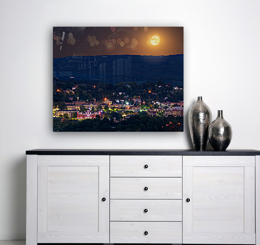 Supermoon rises in the sky above Morgantown in West Virginia Reproduction