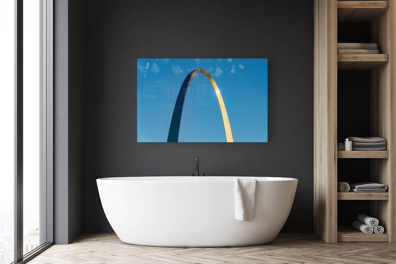 Unusual view of Gateway Arch at sunrise against blue sky Reproduction