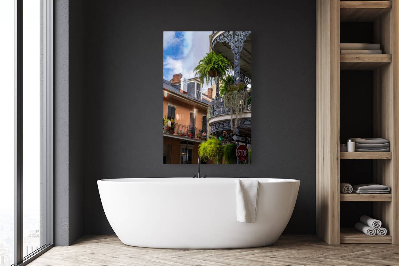 Traditional wrought iron balcony on brick New Orleans house Reproduction