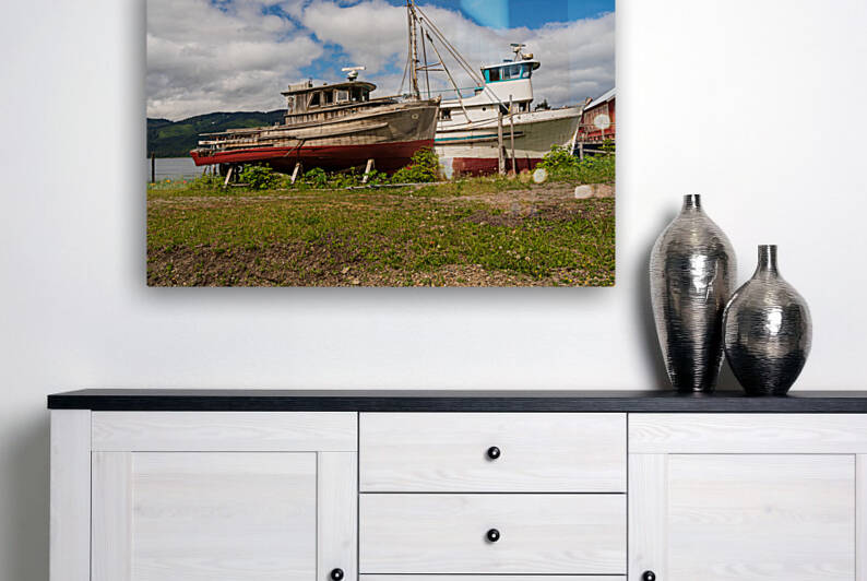 Historic but rotting fishing boats by ocean at Icy Strait Point by Steve Heap
