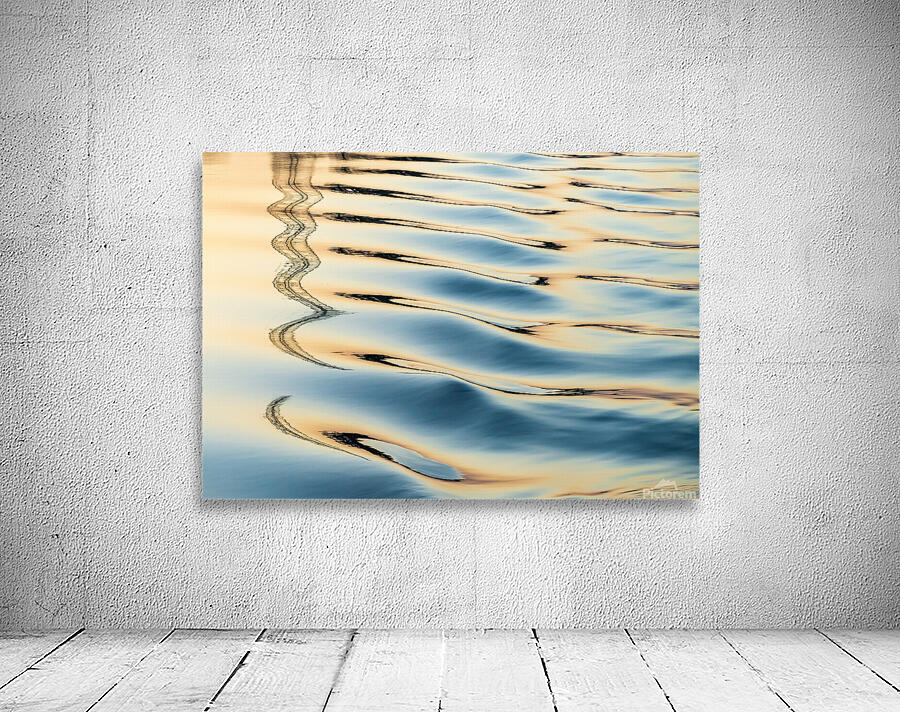 Reflections of electricity pylon at sunset in gentle river rippl Wall Preview