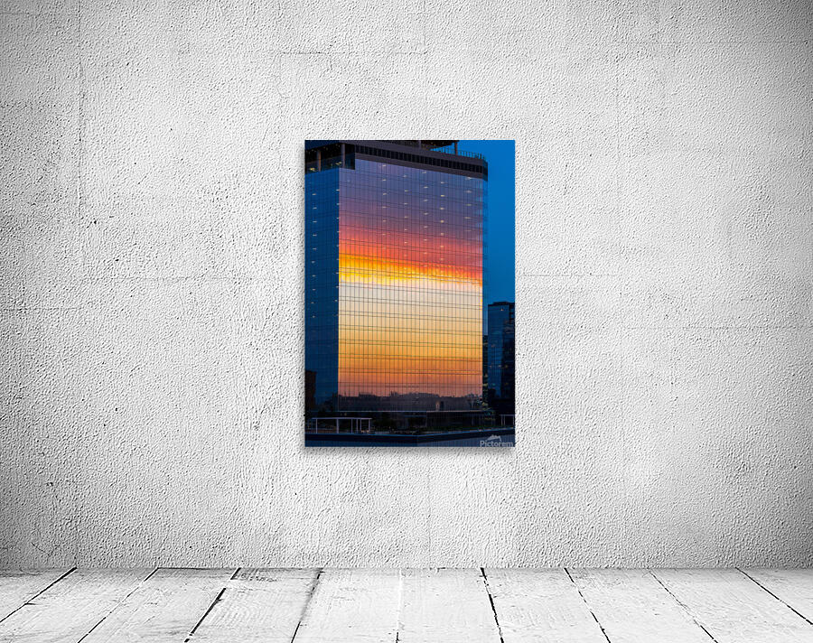 Brilliant sunset reflected in the glass of new office building Wall Preview