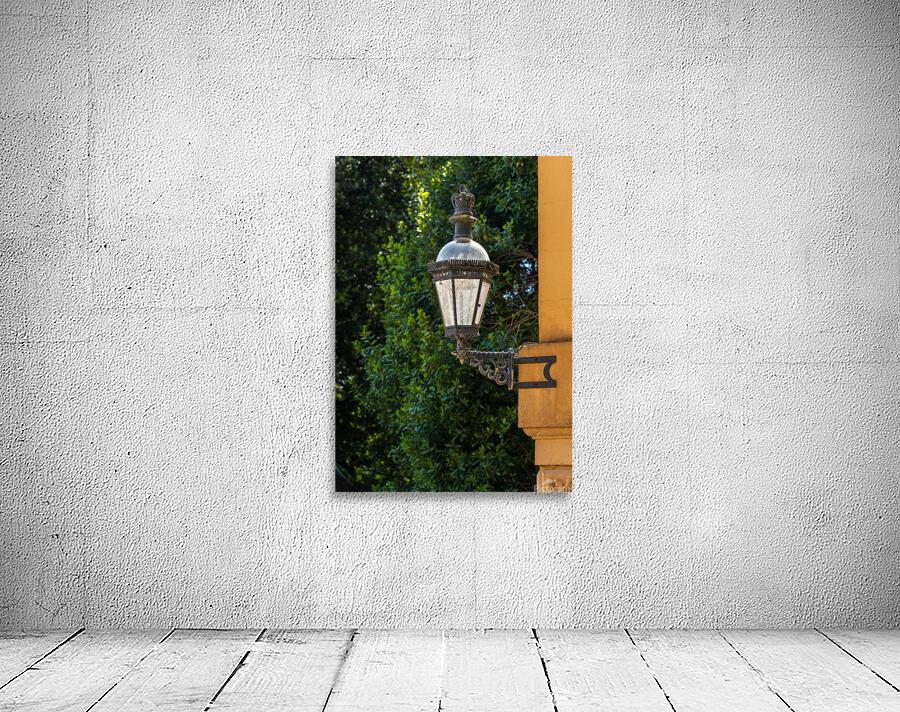 Historic english street lantern attached to warm stone building Wall Preview