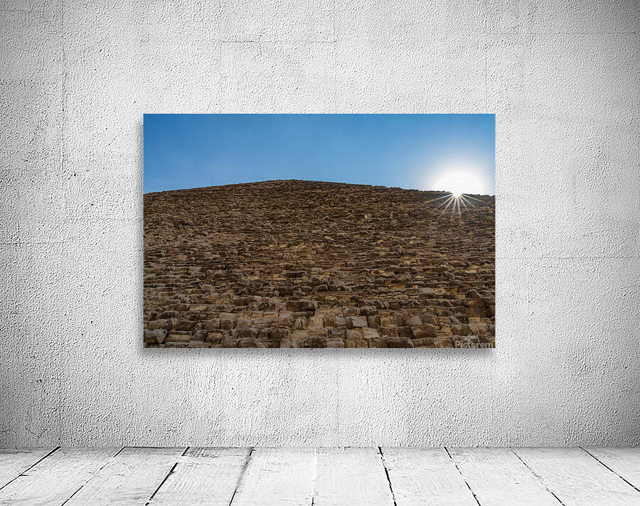 Great Pyramid of Giza with the sun flaring over the top edge Wall Preview
