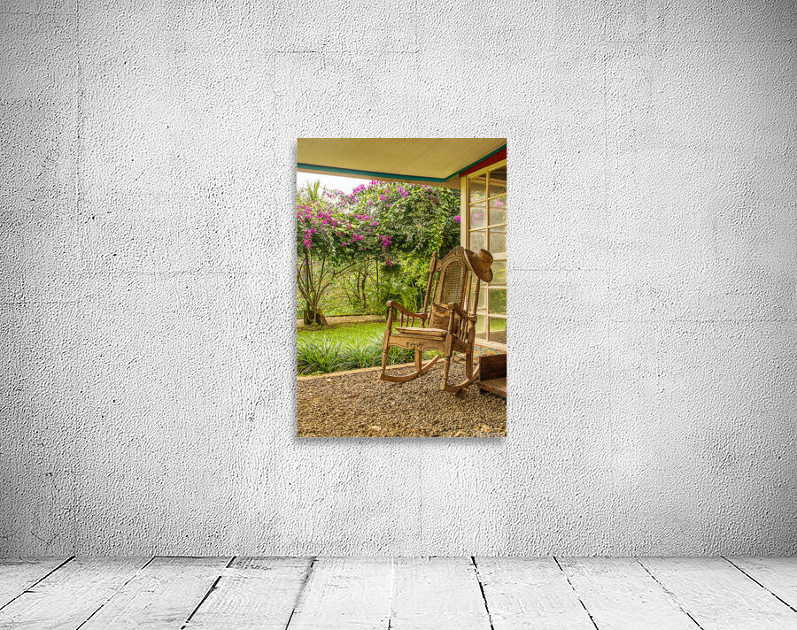 Portrait format of vintage wooden rocking chair on a porch Wall Preview