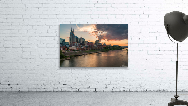 Skyline of Nashville in Tennessee during dramatic sunset over the river Wall Preview