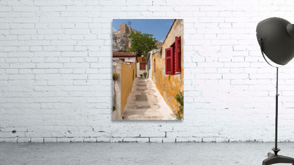 Narrow street in ancient district of Anafiotika Wall Preview