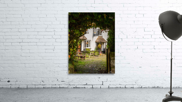 Thatched pub garden in Lustleigh in Devon Wall Preview