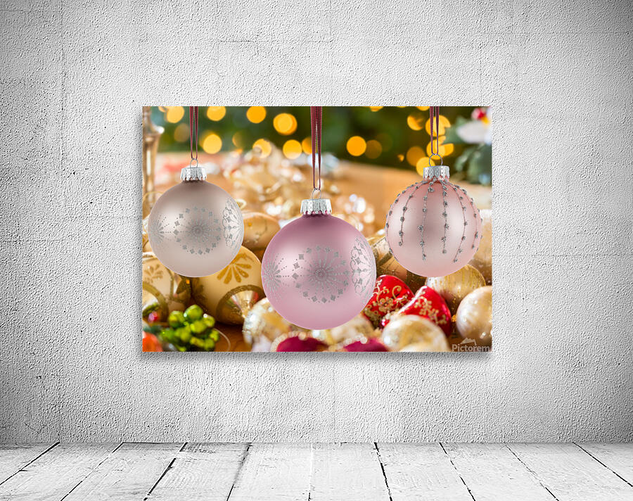 Three Christmas decorations on strings Wall Preview
