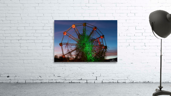 Ferris Wheel ride at abandoned funfair  Wall Preview