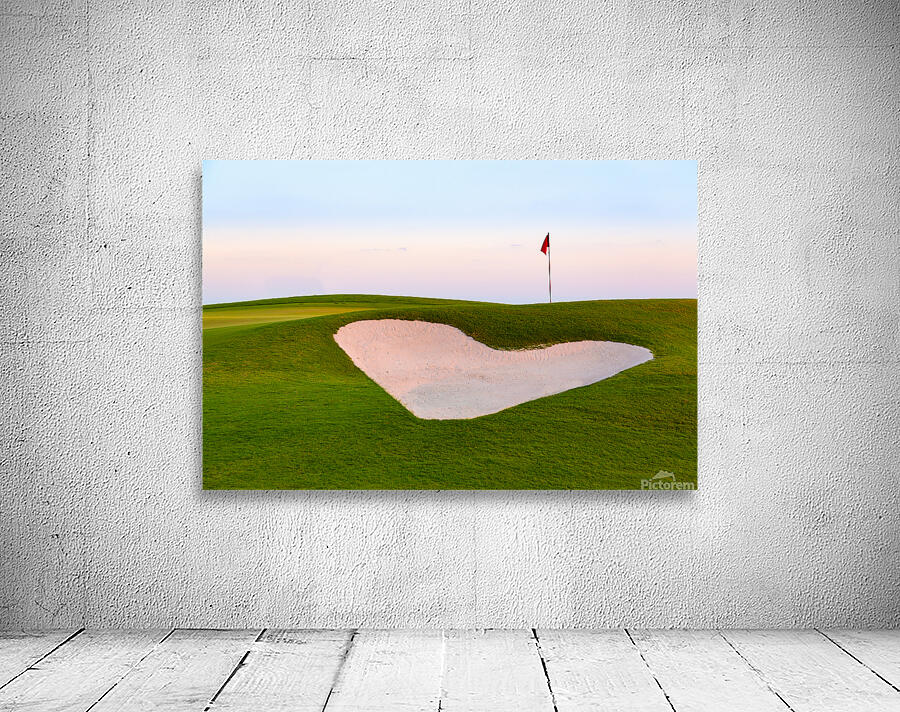 Heart shaped sand bunker in front of golf green Wall Preview
