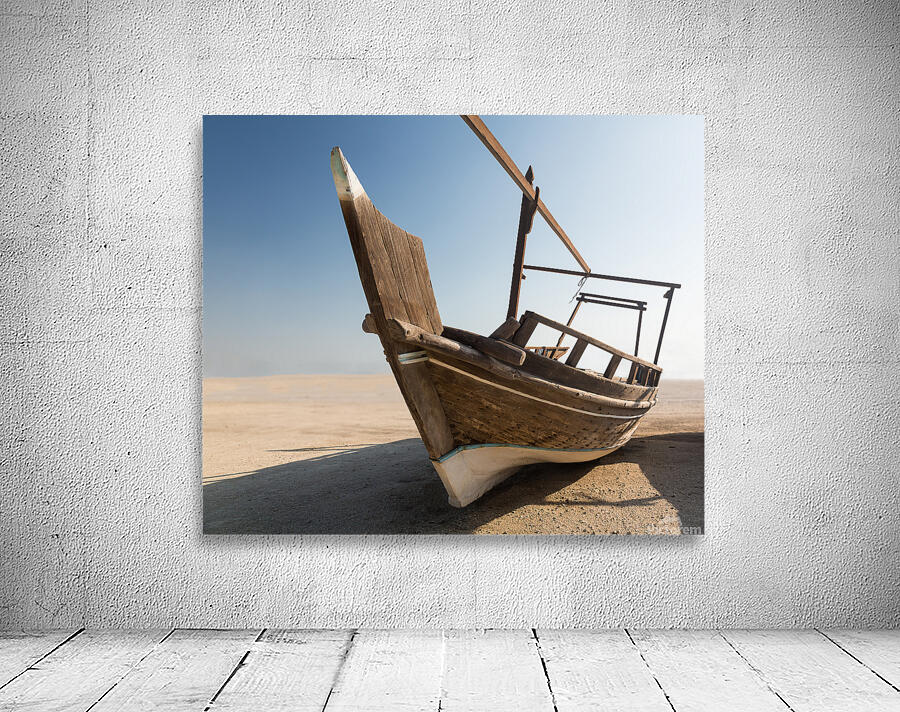 Fishermans boat or dhow on sand Wall Preview