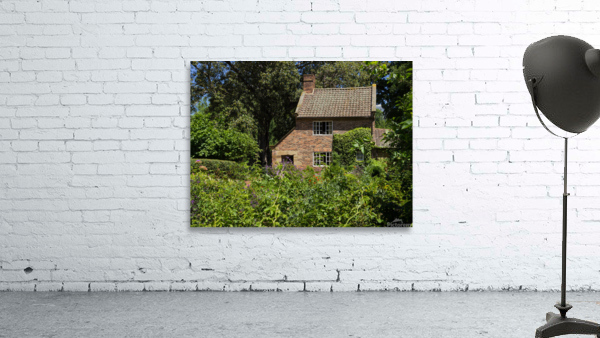 Cottage garden of small brick home Wall Preview