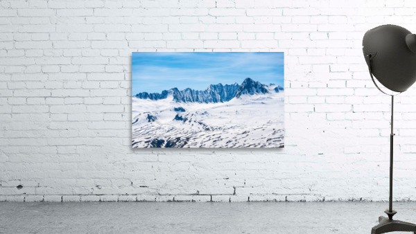 Majestic mountains of Thompson Pass rise over trees Wall Preview